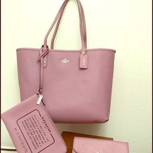 Reversible coach tote plus coach wallet .